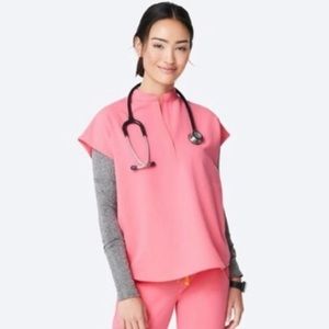 Figs neon pink scrub top.